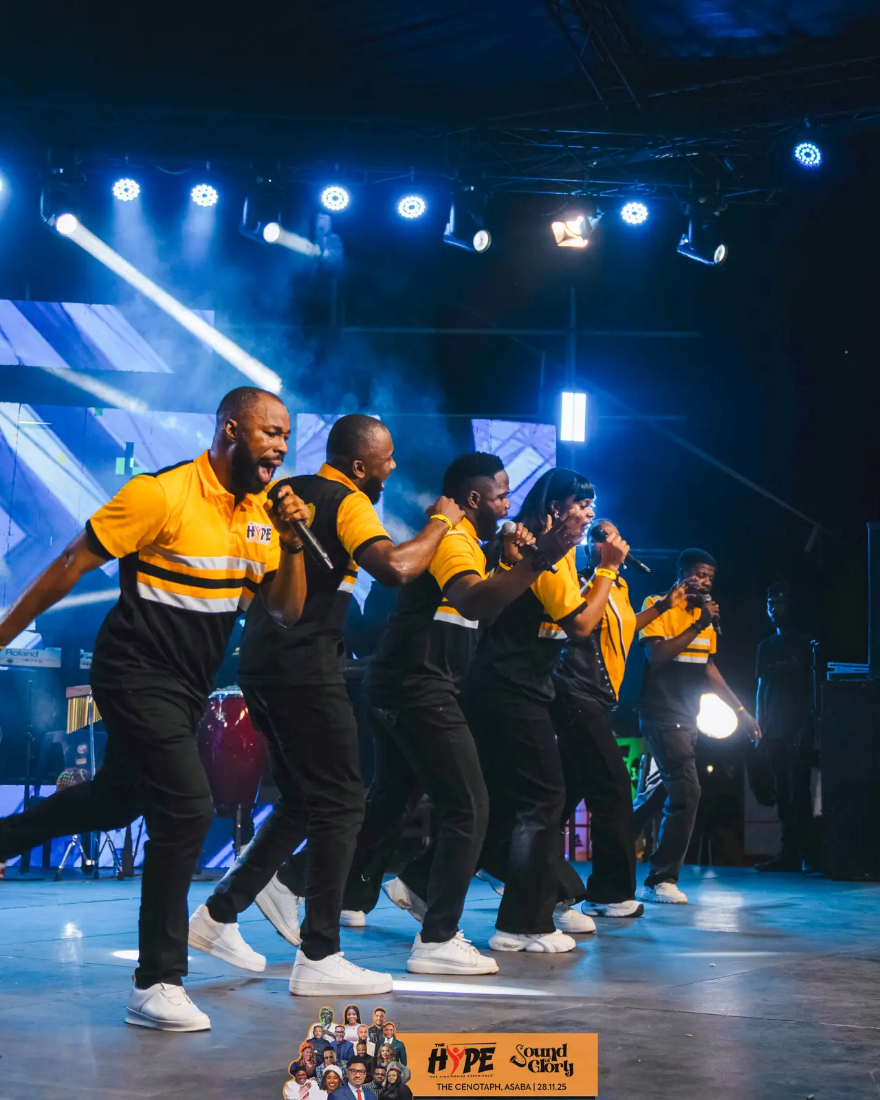 The praise team dancing across the stage