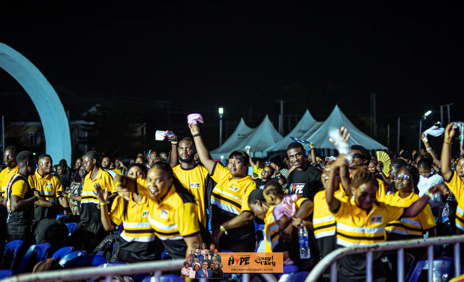 The crowd on their feet in HYPE yellow